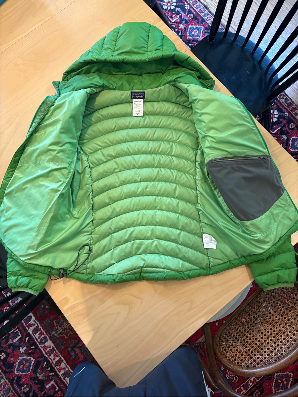 Patagonia women’s green hooded puffer jacket